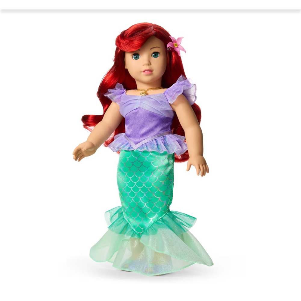 American Girl Doll with Red Hair and Purple Top